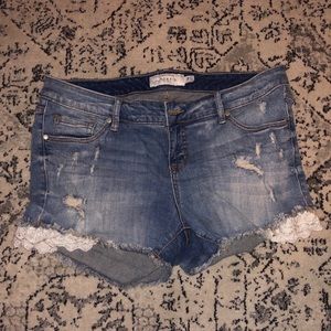 TORRID lightly distressed shorts